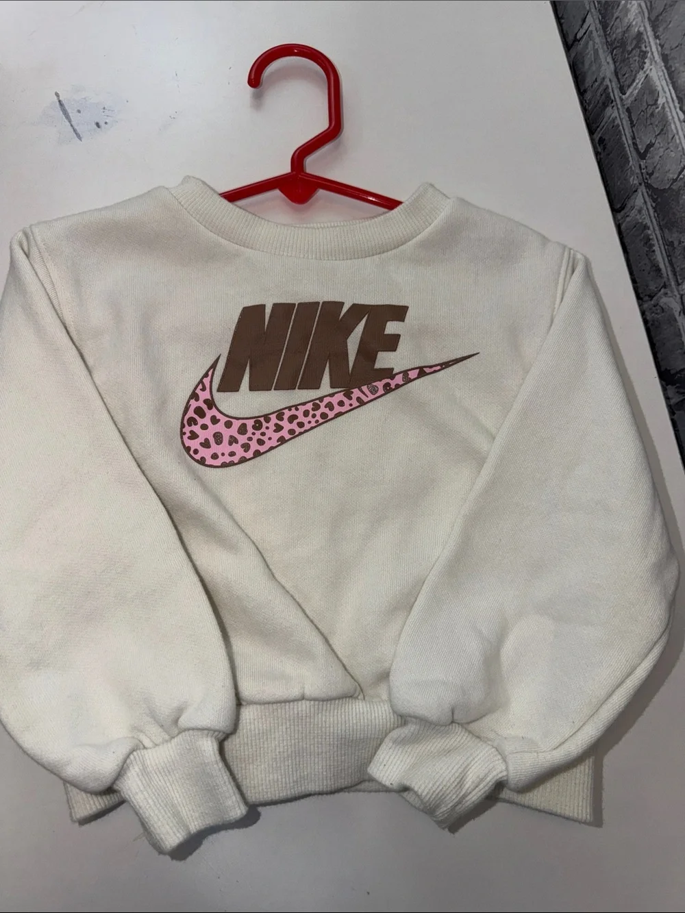 Girls Nike Cream Crewneck with Brown Logo and Pink Leopard Swoosh